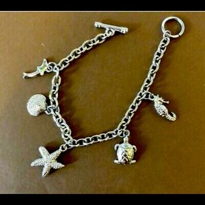 Approximately 7" Bracelet

Dolphin
Shell
Starfish
Turtle
Sea Horse
